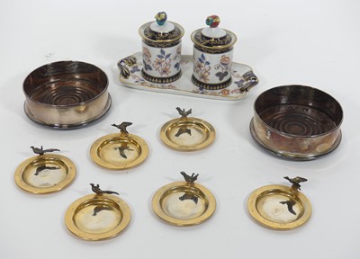 Lot 144 - A pair of French porcelain preserve jars, on...