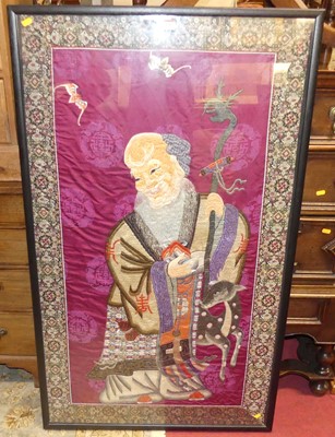 Lot 1202 - A Chinese silkwork panel, depicting Shouxing,...