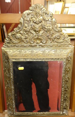 Lot 1047 - A 19th century Dutch embossed brass framed and...