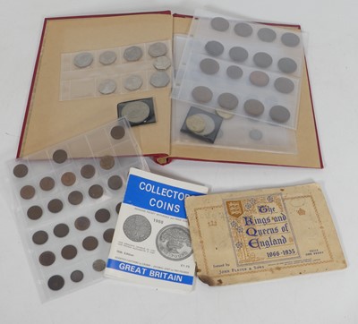 Lot 329 - An album of coins to include Elizabeth II 50...
