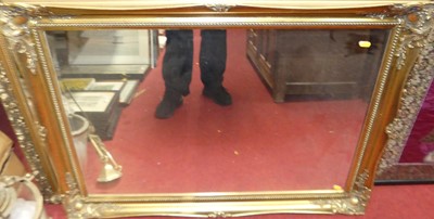 Lot 1071 - A reproduction gilt framed and bevelled...