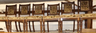 Lot 1195 - A set of six Edwardian oak and floral...