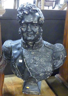 Lot 1207 - A large black painted composite & plaster head...