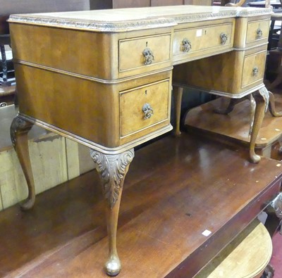 Lot 1215 - A figured walnut and a gilt tooled leather...