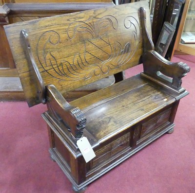 Lot 1238 - An early 20th century line carved oak twin...