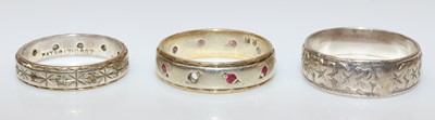 Lot 245 - A silver and 9ct gold wedding band, size I/J;...