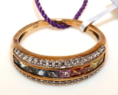 Lot 246 - A new 9ct gold multi-stone set half eternity...