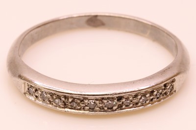 Lot 248 - A new platinum and diamond set half eternity...