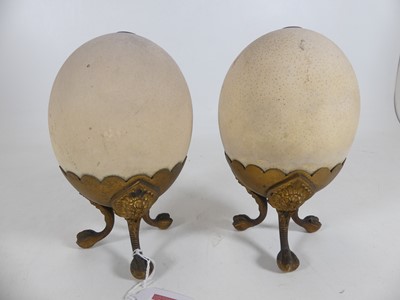 Lot 419 - A pair of gilt metal mounted ostrich egg...