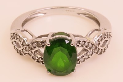 Lot 255 - A modern 9ct white gold tourmaline dress ring,...