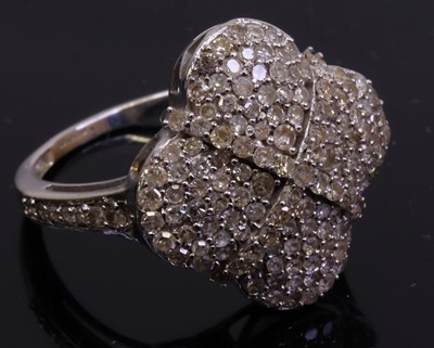Lot 256 - A modern 9ct white gold multi-diamond set...