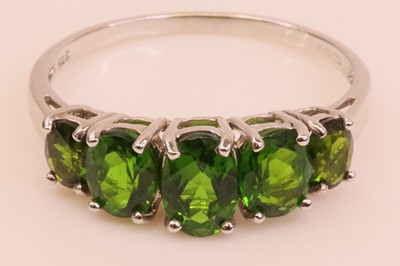 Lot 257 - A modern 9ct white gold and green tourmaline...