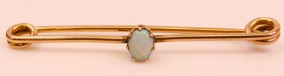 Lot 265 - A 9ct gold cabochon opal set safety pin bar...