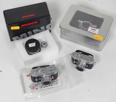 Lot 446 - A group of three Minox miniature digital cameras