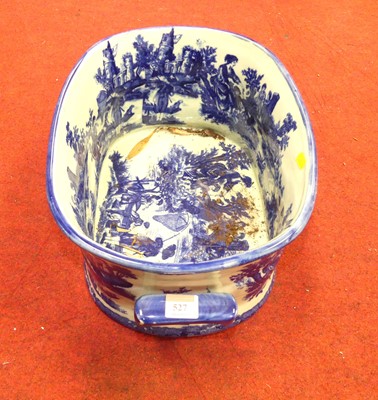 Lot 527 - A reproduction transfer decorated pottery foot...