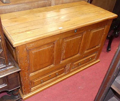 Lot 1255 - A pitch pine three panelled hinge topped mule...