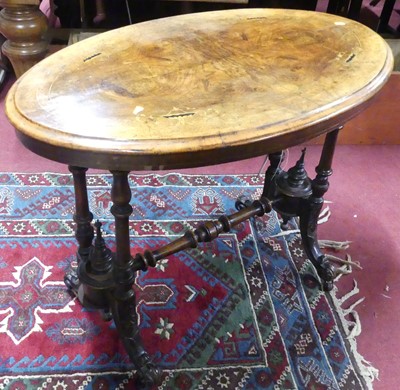 Lot 1258 - A mid-Victorian figured walnut and inlaid oval...