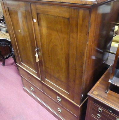 Lot 1259 - A mid-Victorian mahogany linenpress, the twin...
