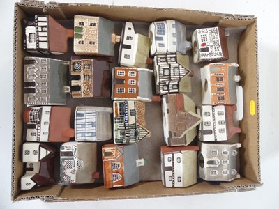 Lot 484 - A collection of Mudlen pottery cottages