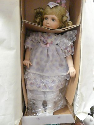 Lot 486 - A collection of contemporary dolls to include...