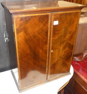 Lot 1266 - A mahogany double door table cabinet, w.48cm
