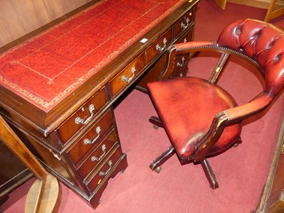 Lot 1269 - A reproduction mahogany and gilt tooled red...