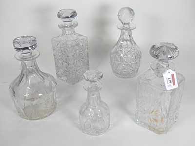 Lot 135 - A group of five cut glass decanters, to...