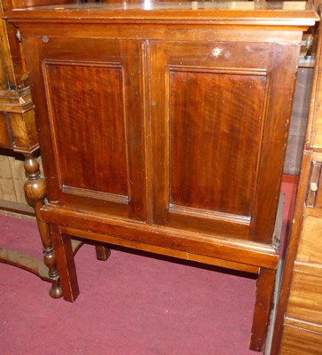 Lot 1275 - An early 20th century walnut double door...