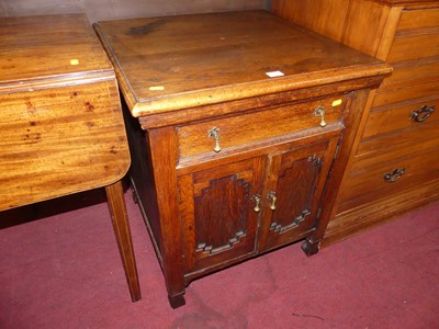 Lot 1279 - A joined oak low double door side cupboard,...
