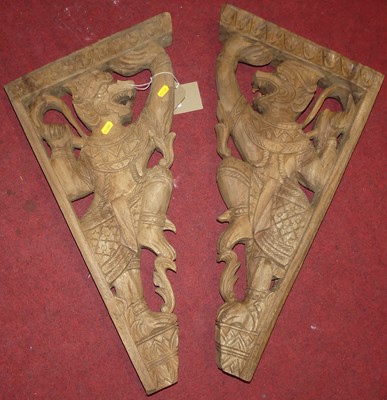 Lot 1282 - A pair of Indonesian carved and pierced...