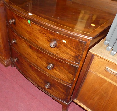 Lot 1285 - A Regency mahogany and crossbanded bowfront...