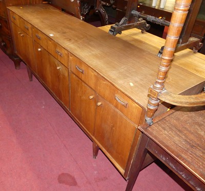 Lot 1290 - A 1960s McIntosh teak long sideboard, the...