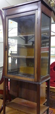 Lot 1295 - An Edwardian mahogany single door glazed china...