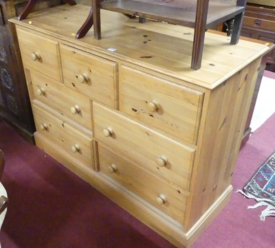Lot 1296 - A contemporary pine side chest, fitted with...