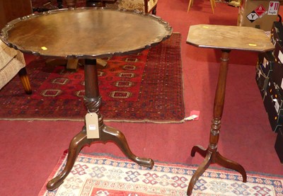 Lot 1299 - A George III mahogany piecrust tilt-top...