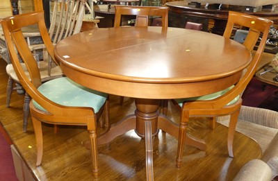 Lot 1300 - A contemporary cherry wood dining suite,...
