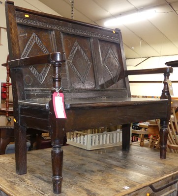 Lot 1302 - An antique joined and chip carved oak...