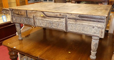 Lot 1303 - An Indian hardwood and iron bound low table,...