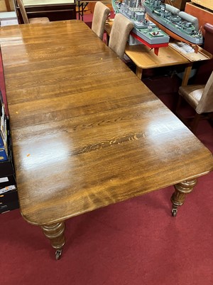 Lot 1304 - A large Victorian style oak round cornered...