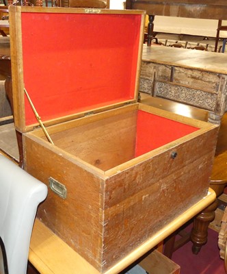 Lot 1307 - An early 20th century oak hinged top silver...