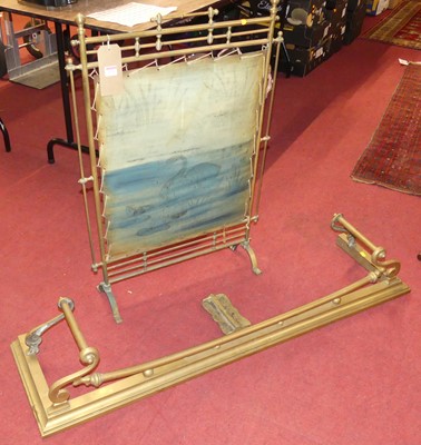 Lot 1321 - A late Victorian turned brass fire screen,...