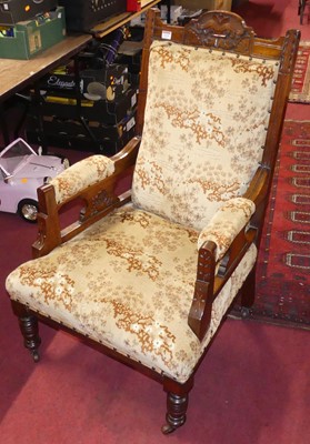 Lot 1325 - A late Victorian relief carved walnut framed...