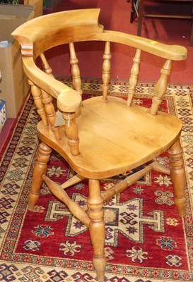 Lot 1334 - A beech tub captain's chair, width 61cm