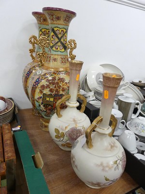 Lot 554 - A pair of satsuma painted porcelain vases,...