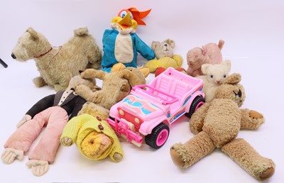 Lot 1573 - a box containing childrens toys and teddy...