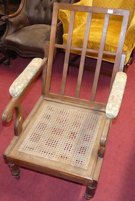 Lot 1362 - A mid-Victorian mahogany scroll nursing chair,...