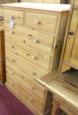 Lot 1381 - A contemporary pine tall squarefront chest of...