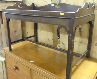 Lot 1382 - A 19th century mahogany butler's tray table,...