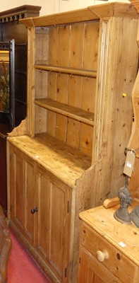 Lot 1397 - A rustic pine one-piece kitchen dresser,...