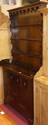 Lot 1399 - A provincial joined oak narrow kitchen dresser,...